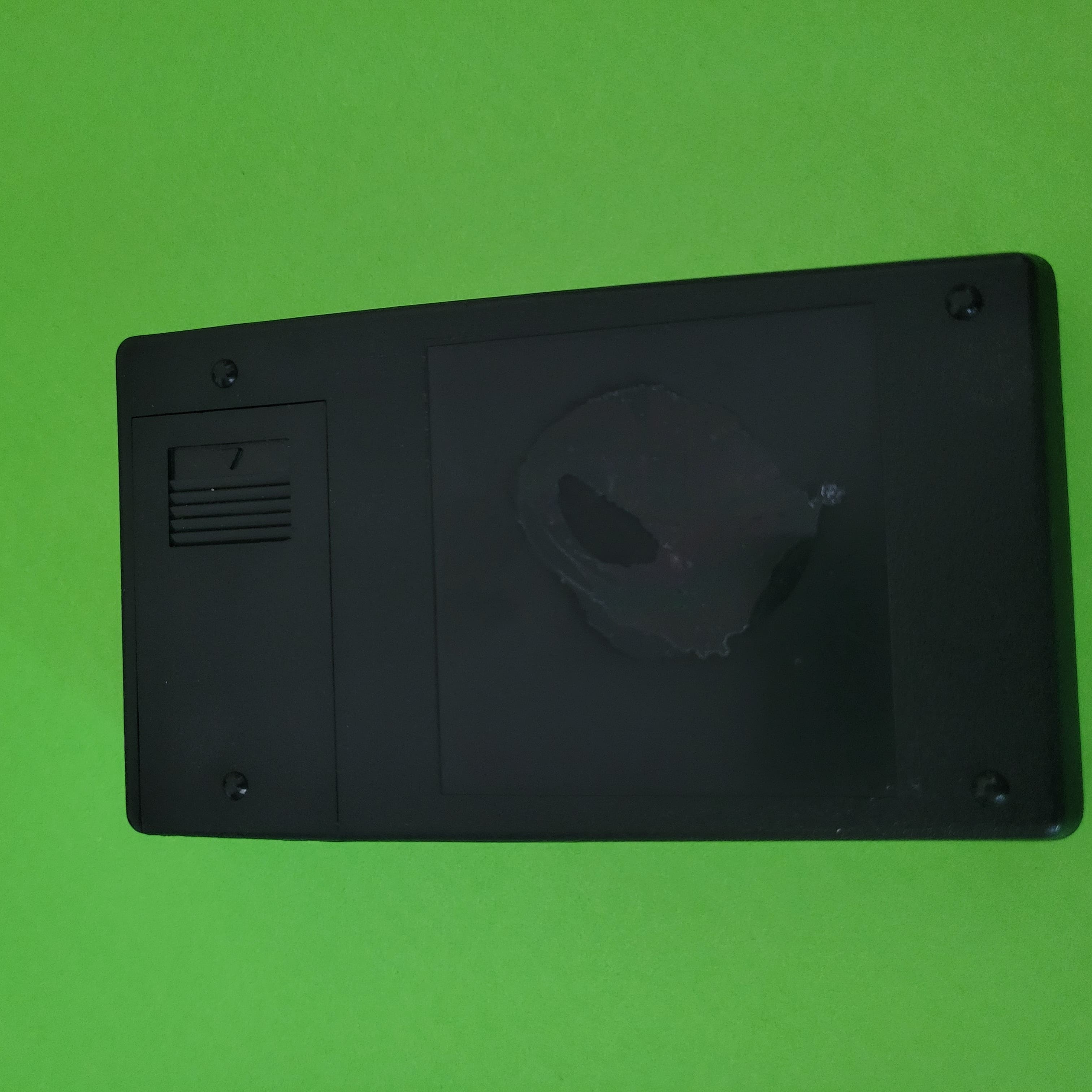 An image of the back of a Unitrex 842D Four function plus calculator
